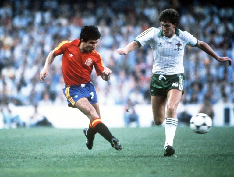 1982 World Cup Finals, Valencia, Spain, 25th June, 1982, Spain 0 v Northern Ireland 1, Spain's Juan Juanito beats Northern Ireland's Norman Whiteside  (Photo by Bob Thomas Sports Photography via Getty Images)
