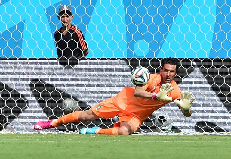 Italy's goalkeeper Gianluigi Buffon dives for the ball during a Group D football match between Italy and Costa Rica at the Pernambuco Arena in Recife during the 2014 FIFA World Cup on June 20, 2014.   AFP PHOTO / GIUSEPPE CACACE        (Photo credit should read GIUSEPPE CACACE/AFP via Getty Images)