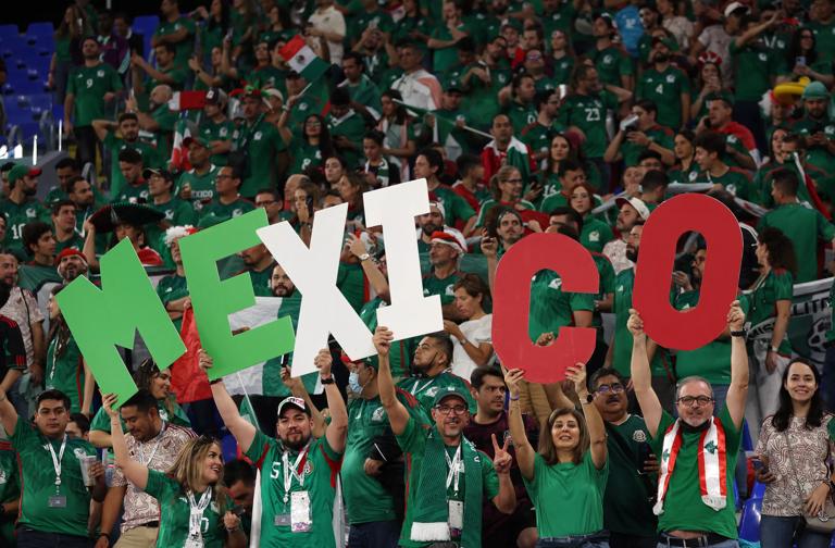 DOHA, QATAR - NOVEMBER 22: Mexican fans enjoy the pre match atmosphere prior to the FIFA World Cup Qatar 2022 Group C match between Mexico and Poland at Stadium 974 on November 22, 2022 in Doha, Qatar. (Photo by Dean Mouhtaropoulos/Getty Images)